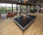 Ping pong table on screened entertainment area